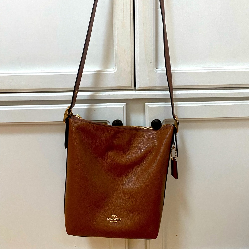 Coach purse. Tan with gold hardware